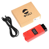 Interface de diagnostic VNCI 6154A rouge avec son câble USB et sa boîte VNCI